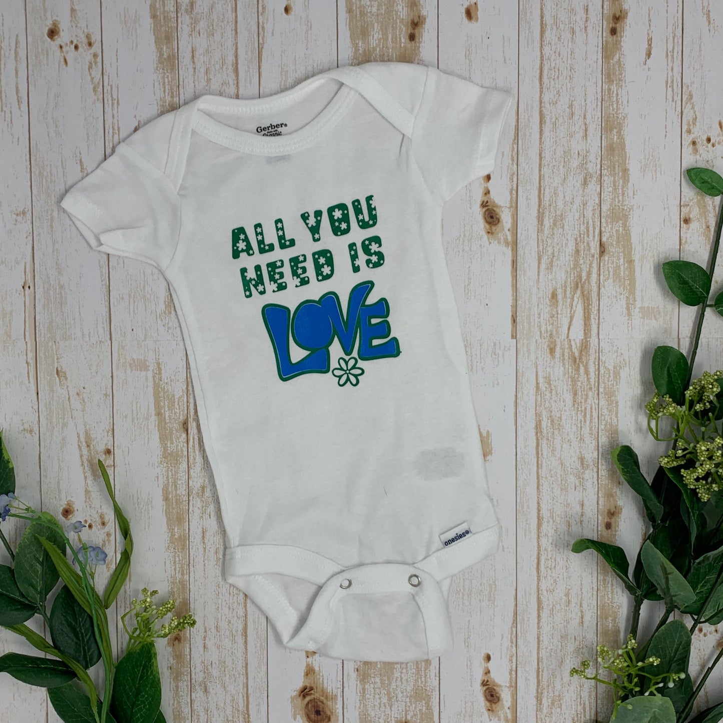 All You Need Is Love Baby Bodysuit