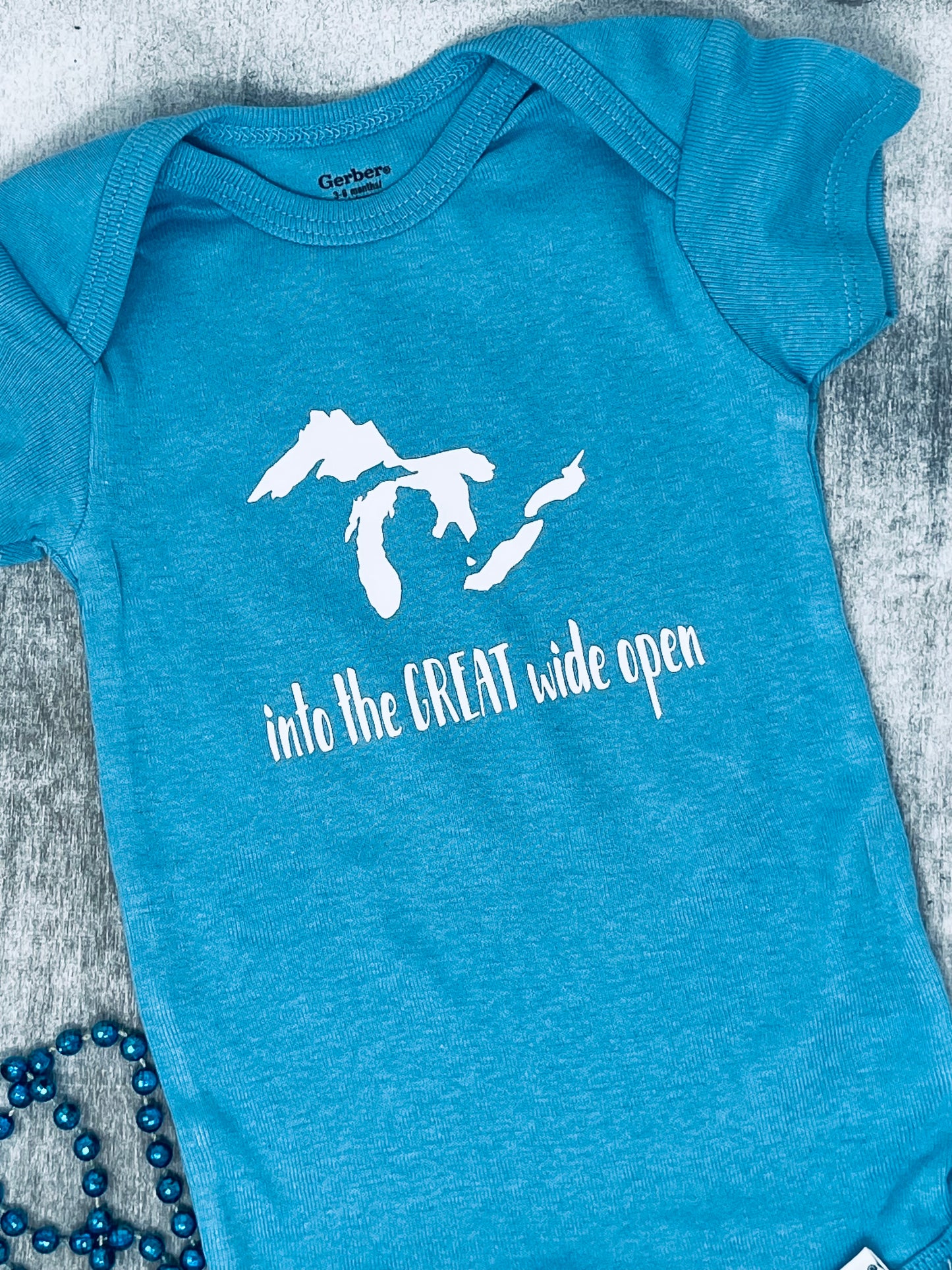 Into the Great Wide Open Baby Onesie