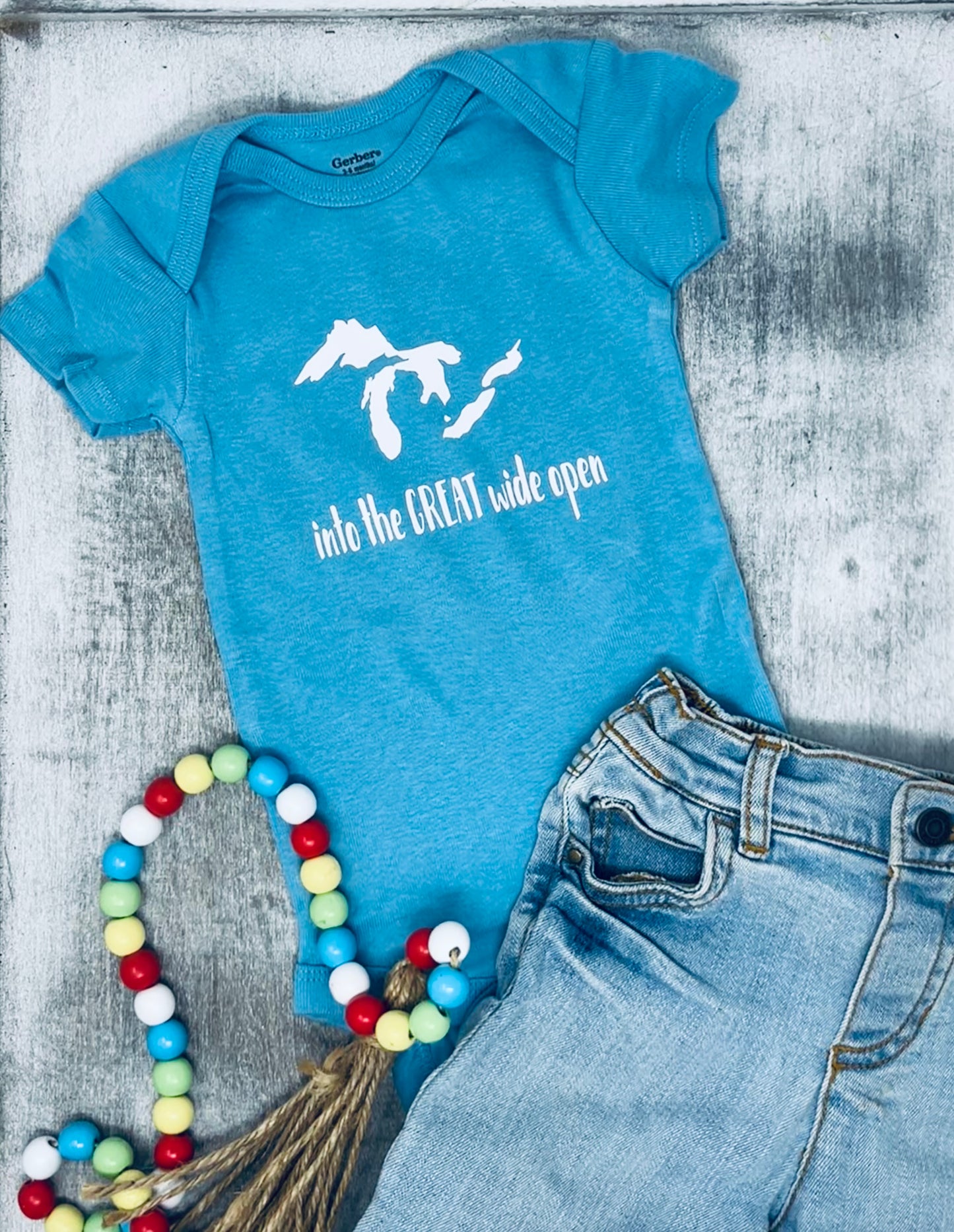 Into the Great Wide Open Baby Onesie