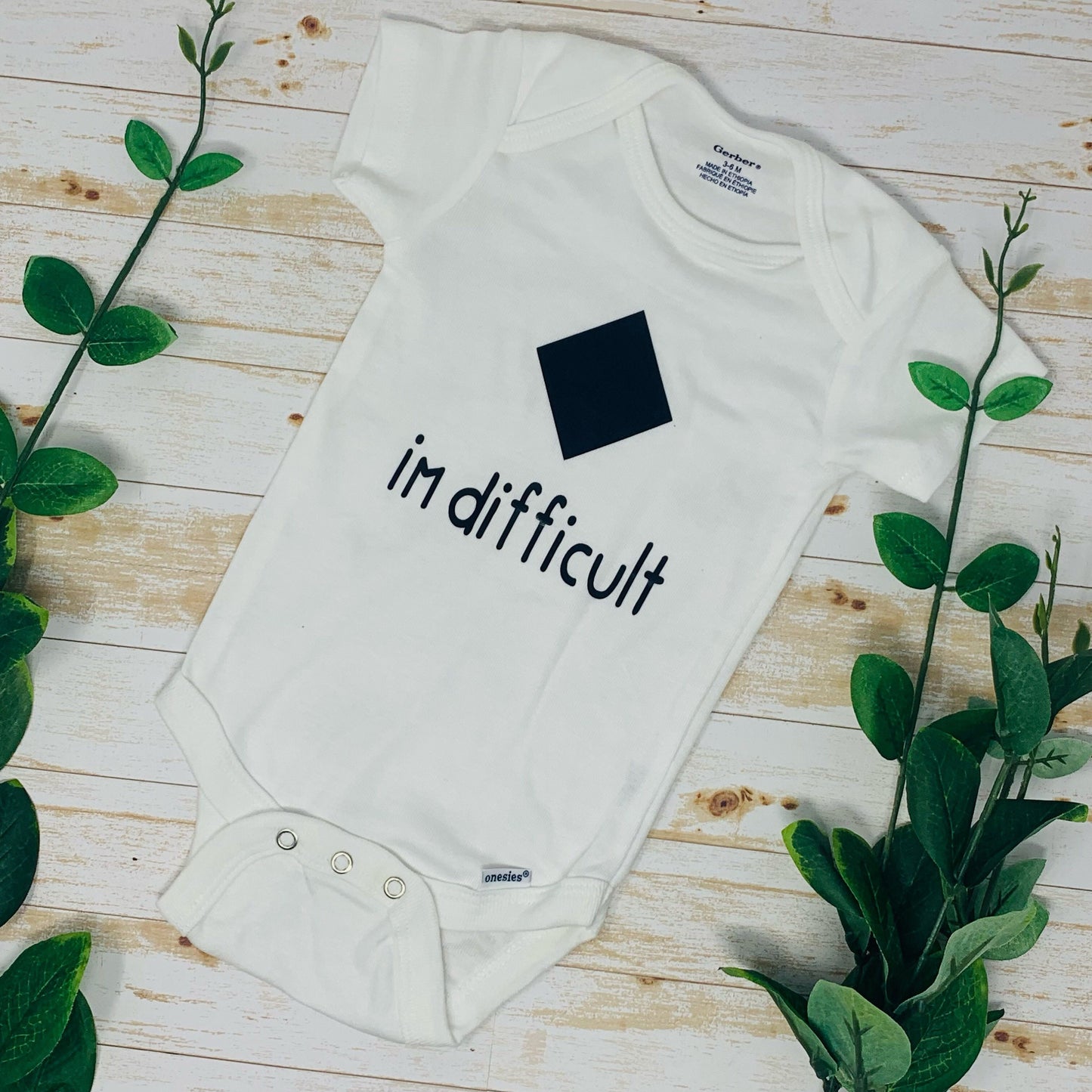 Black Diamond I’m Difficult Baby Bodysuit