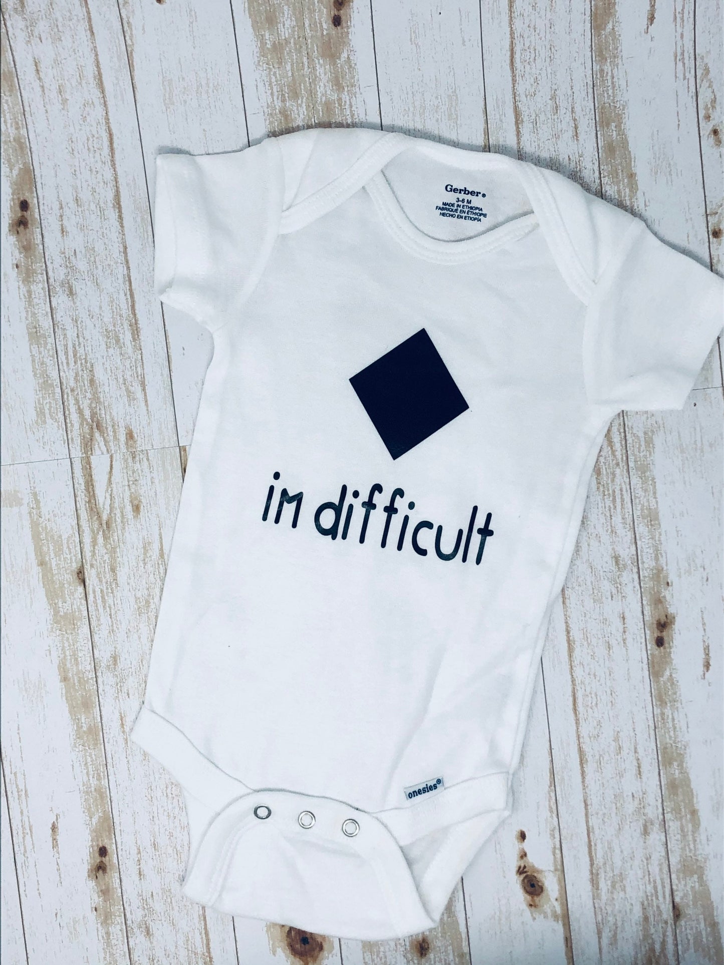 Black Diamond I’m Difficult Baby Bodysuit