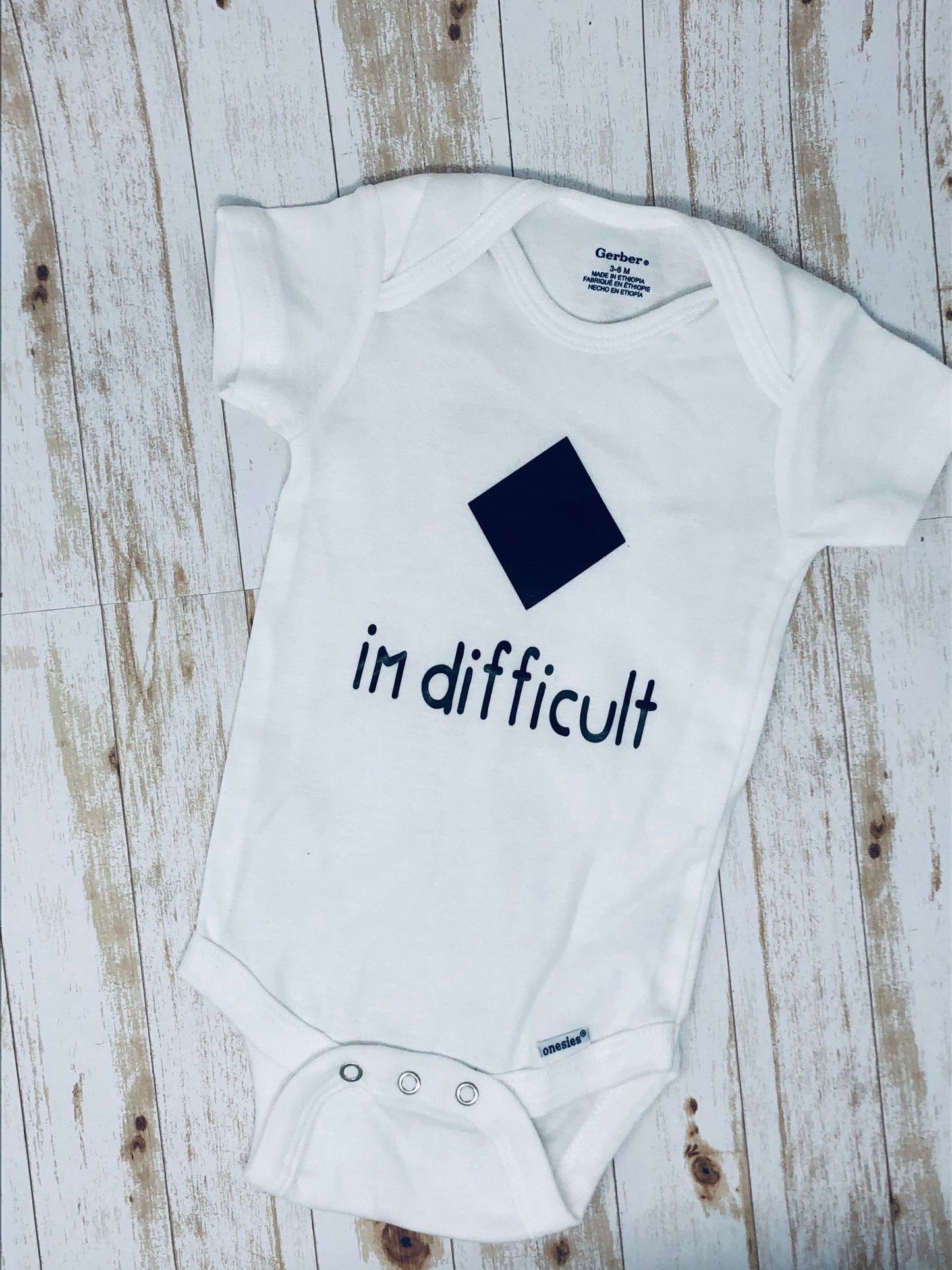 Black Diamond I’m Difficult Baby Bodysuit